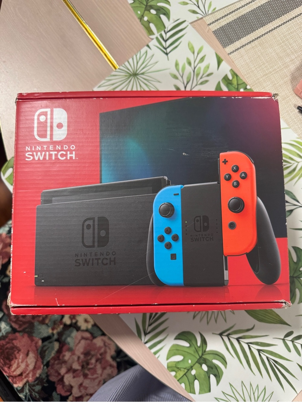 Nintendo Switch Console with Neon Blue and Neon Red Joy-Con